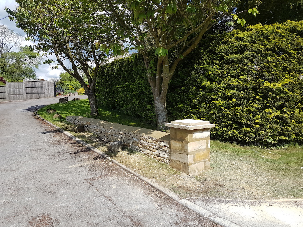 Minchinhampton entrance wall and pillar.