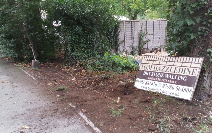 Tom starts work on the repair of a dry stone wall